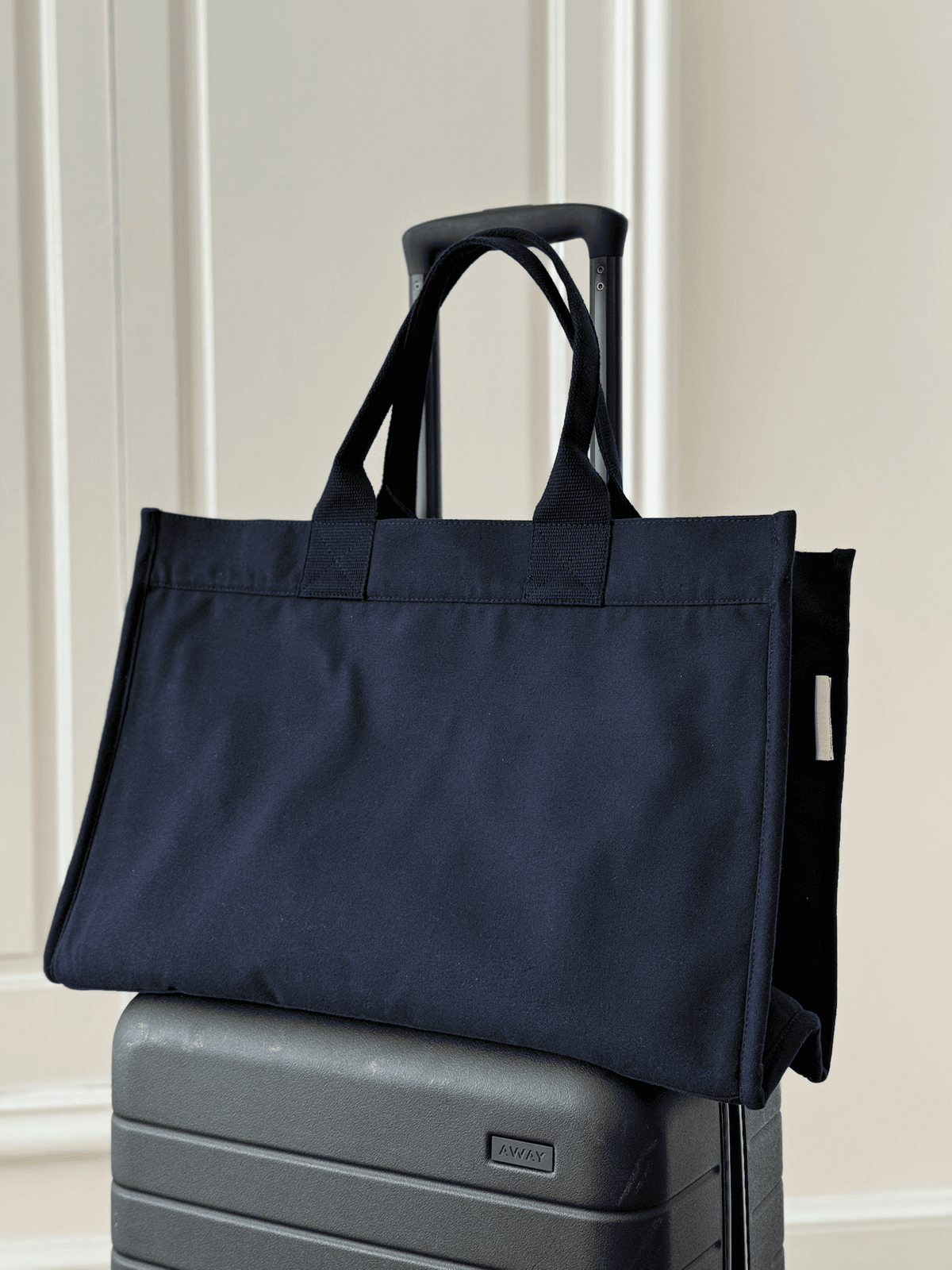 Anywhere Bag - Zip-Top Tote with Trolley Sleeve in Navy SPLIT LETTER MONOGRAM - Quilted Koala